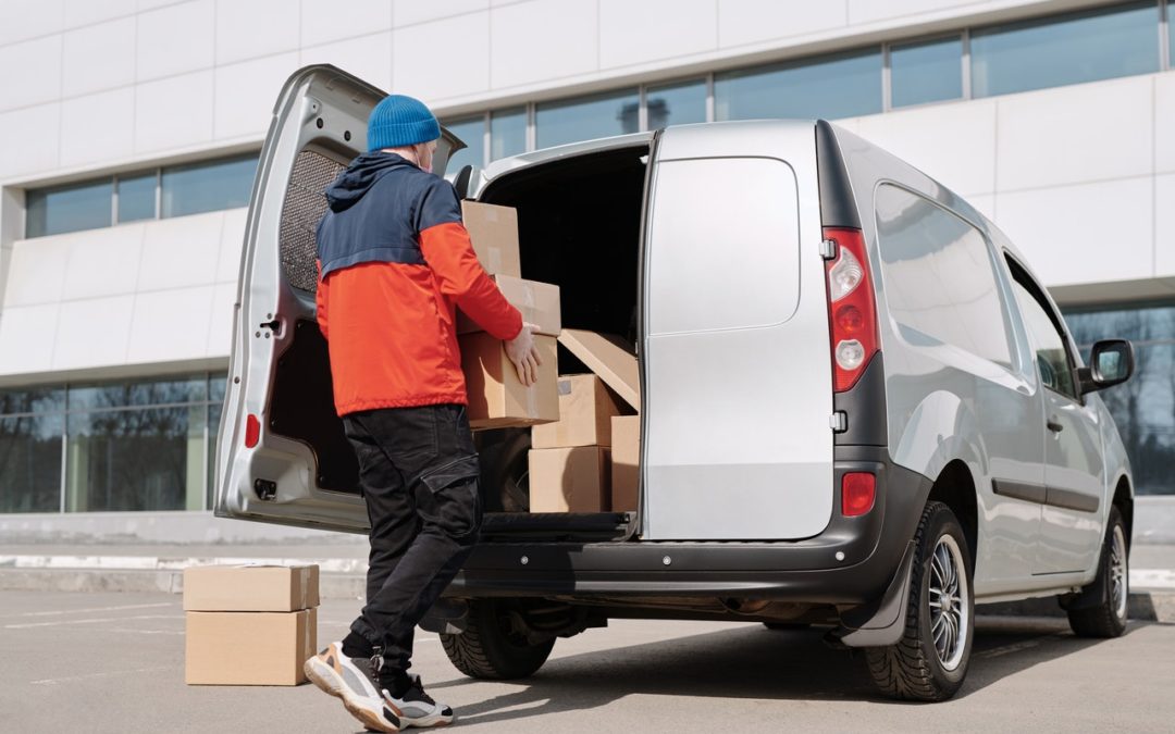 person loading a delivery van